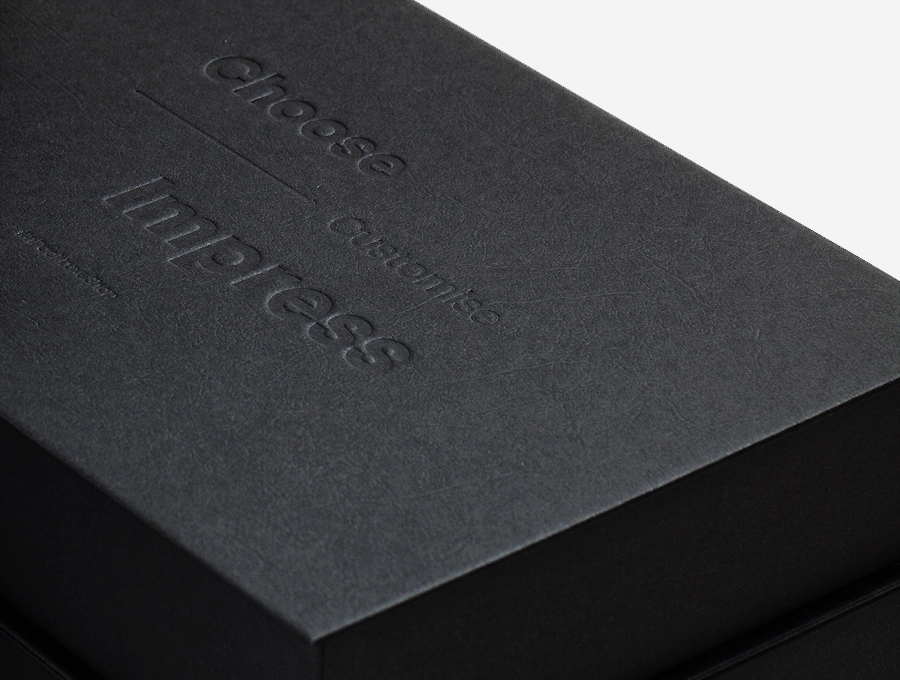 High end magnetic box in Colorplan Ebony with leather embossing and hot foiled logo, produced in Europe