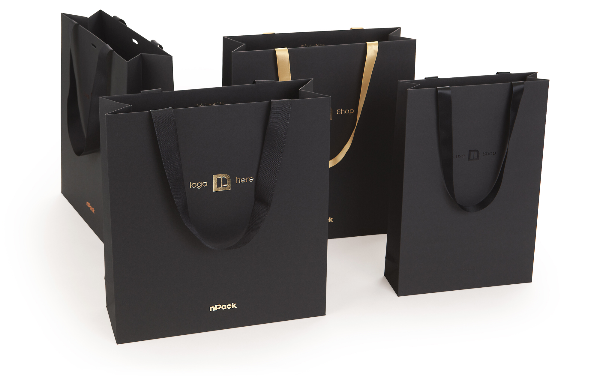 black paper bags with ribbon handles foil blocking embossed logo